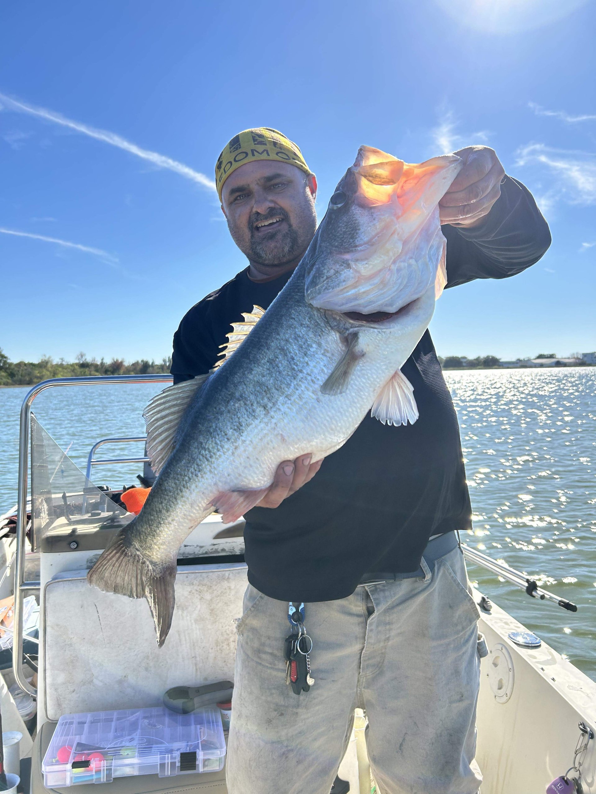 mikel melusen holding their catch